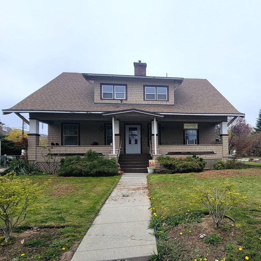 Apple Blossom House, a craftsman home with a wide front porch